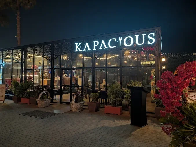 Kapacious illuminated storefront at Megazone, F-9 Park